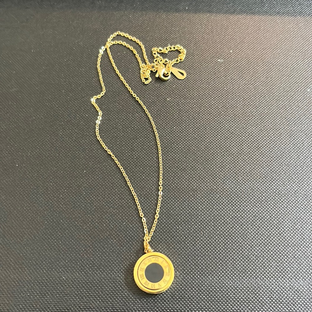 Roma  lariat necklace black enamel. 2 sided with mother of pearl.